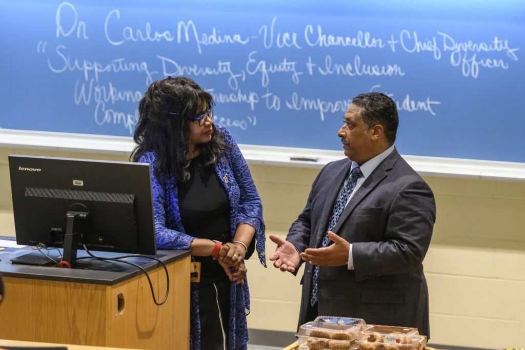 A blue banner with yellow letters on it.