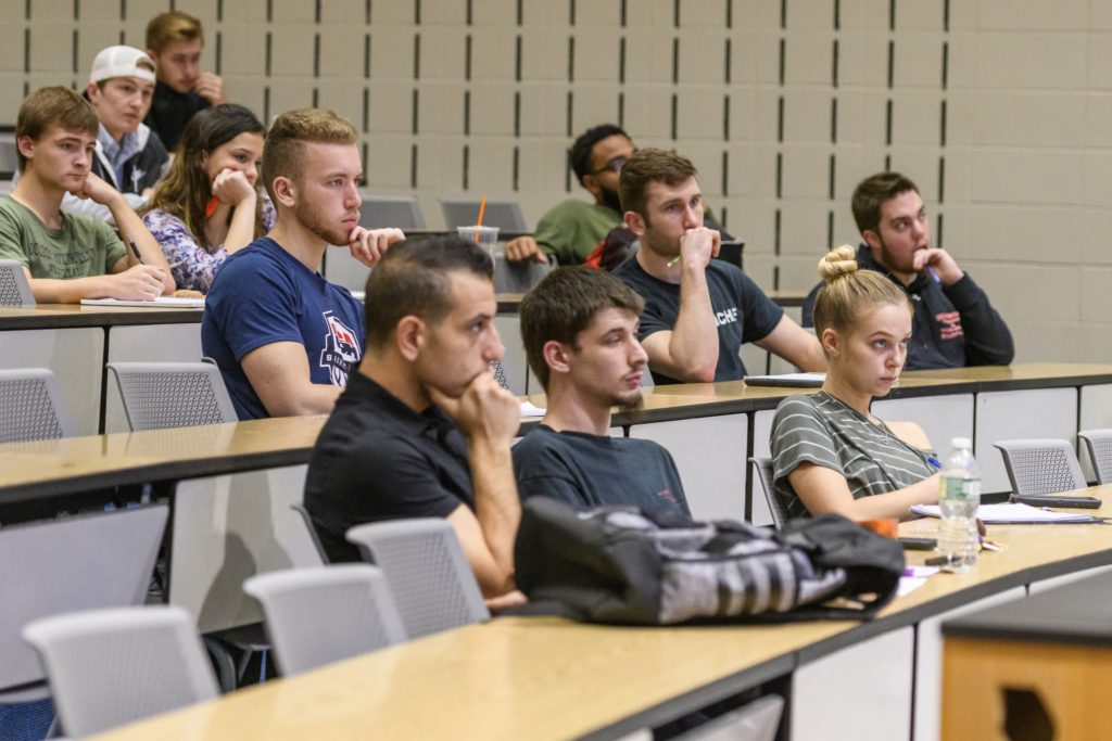 A blue banner with yellow letters on it.