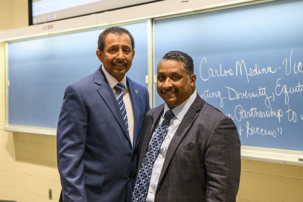 A blue banner with yellow letters on it.